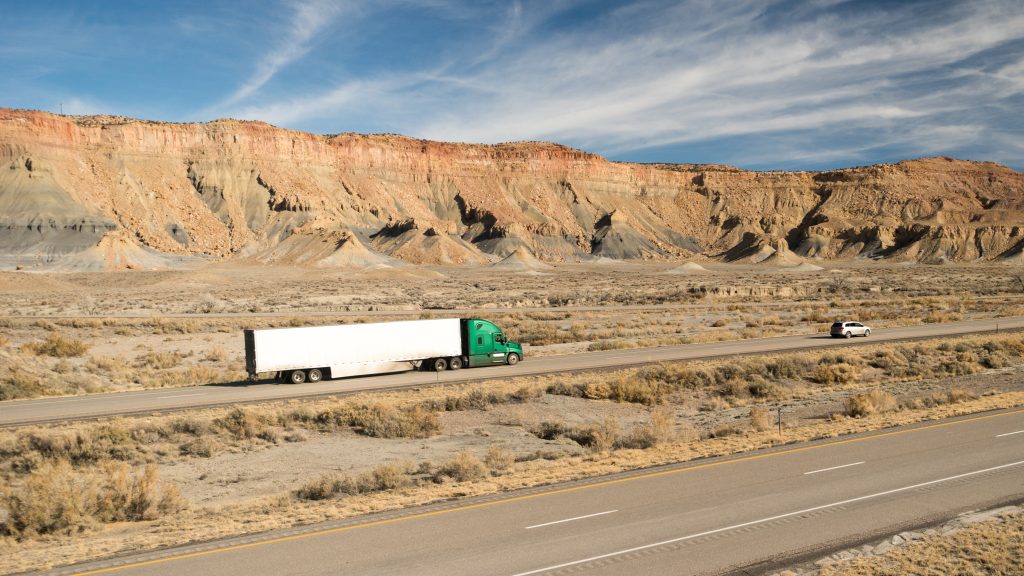 A Truck driving on the Highway.